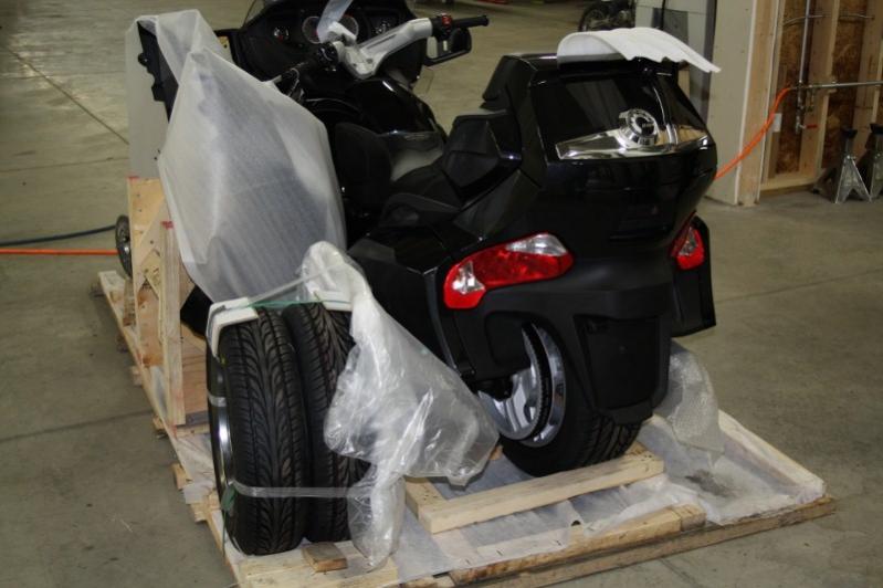 The front tires are together on the left rear.