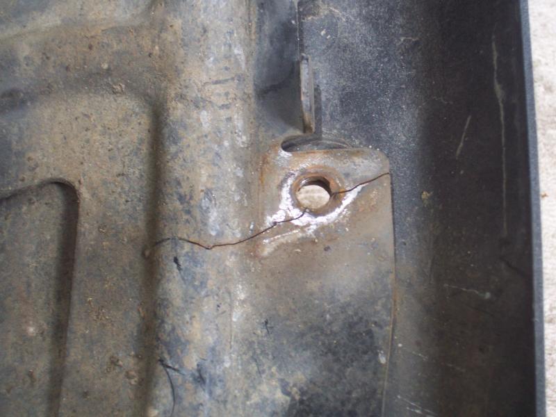 The upper left mounting hole.