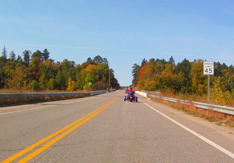 These folks took time out from fishing to wave as we rode past.