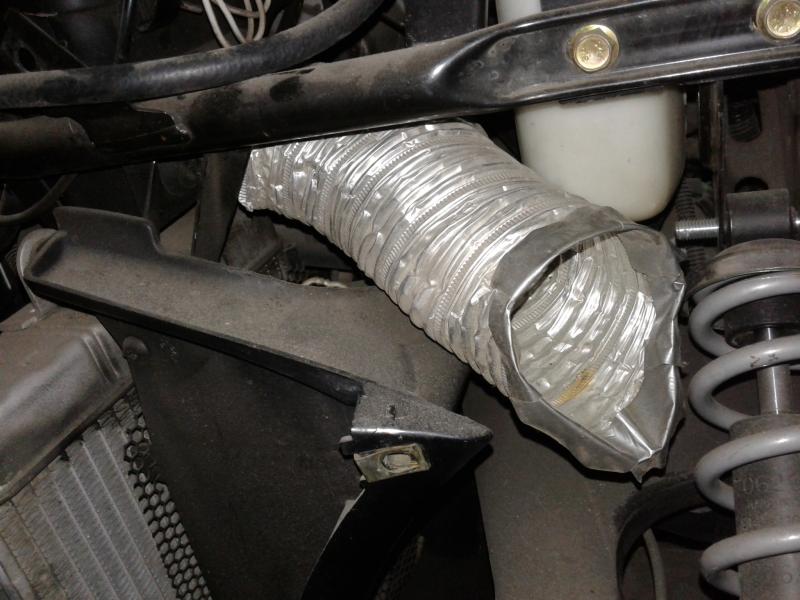 this is alum. dryer tube connected to the OEM air box snorkels