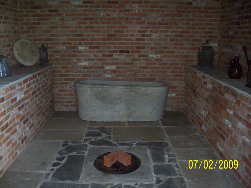 This is the buttery; well in center was 8 feet deep and used for cold storage of butter and milk.