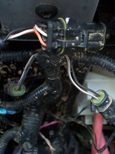 This is the connector for the brake and tail lights. The indicator wiring is easy to find.