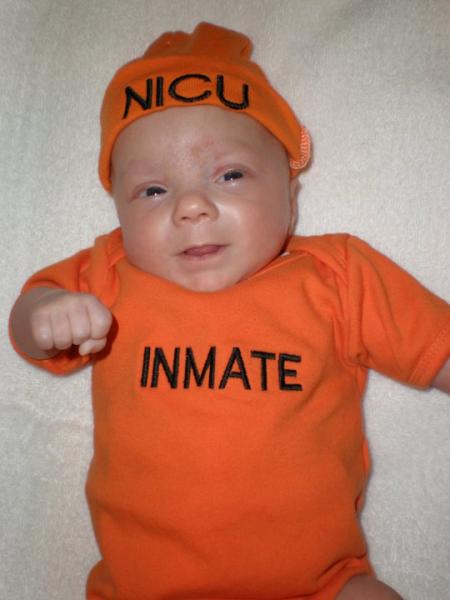 This is the outfit we did for the birth announcement given her 79 days in the NICU.