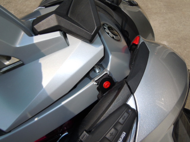 To remove the helmets, the backrest will pop up to the safety catch which allows enough room to remove the helmets over the stud.