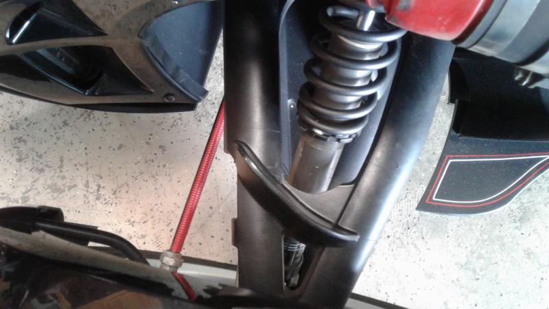 Trimmed the A arm cover to allow full clearance for the shock. You will have to trim both sides and the upper panels as well. Will add photos when fin