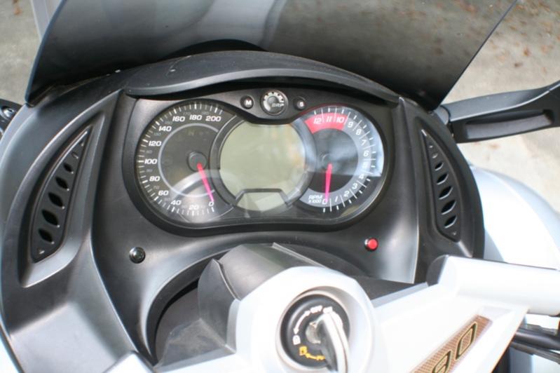 Two little buttons Black to open Truck, Red to open Garage door.