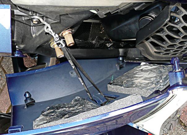 Upper left side panel tether