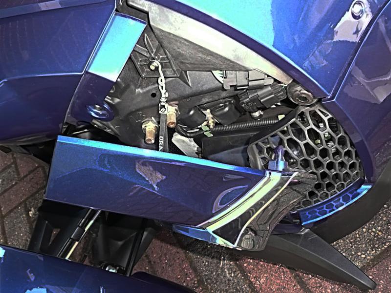 Upper left side panel tether