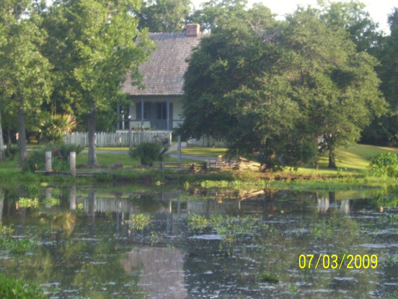 Vermillionville house with pond, Lafayette, LA.