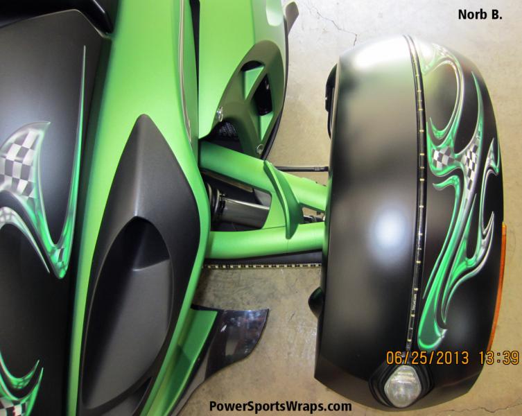 We created this fender piece to help pull the colors of the machine out onto the fenders. What a great touch.. Email: pete@powersportswraps.com
