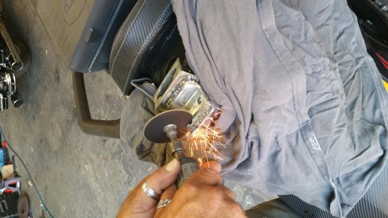 welding and cutting down the bracket to make it easier to reinstall the rear center plastic
20150521 192102