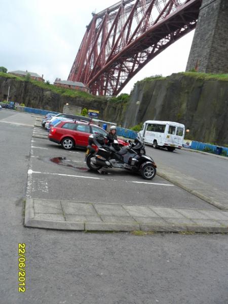 Wife and Spyder under the Forth Rail Bridge Scotland