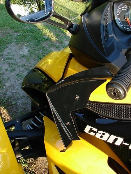 Wind deflectors...took these off because they readjusted the air flow around the bike and caused a horrible gas smell whether you were moving or not.