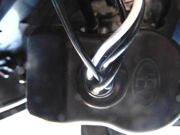 WIres through grommet on cover