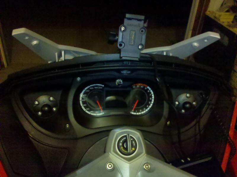 Working on adding the mods 
Added 2 ram mounts where the analogue gauges were
Right side for Rear View Camera LCD
Left side for Much Desired Cup-Holde