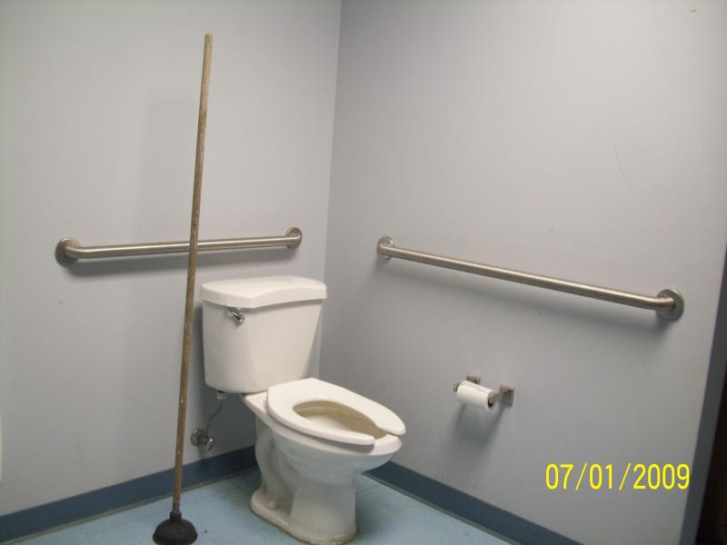 Wouldn't touch it with a 10 foot pole. This is the facility at the Aromory; wonder why the very long handle? I didn't ask!  LA Army National Guard, Ab