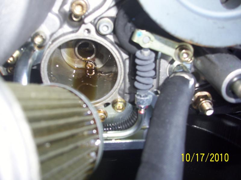 You can see the reverse lever here. I put a few drops of oil on the cable end and inside the bellows. It works a little smoother now.